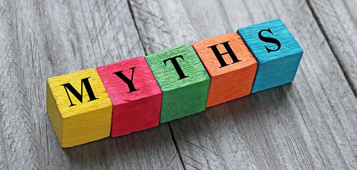 word myths on colorful wooden cubes