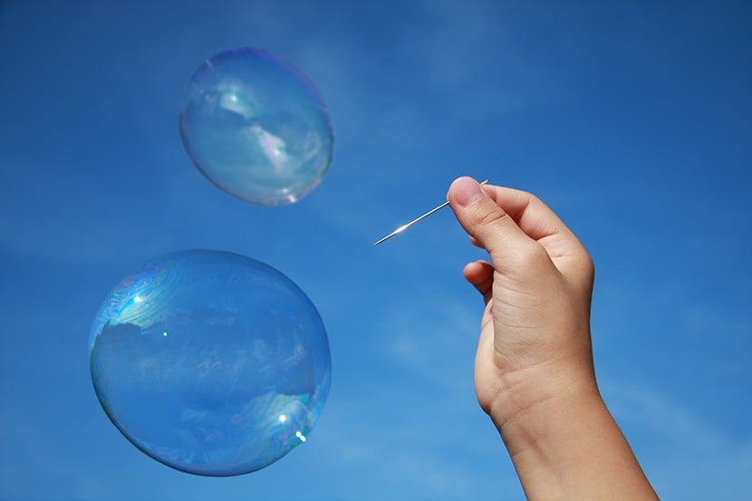 How Real Estate Bubbles Form and Why They Pop