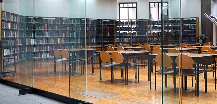 modern library: empty reading room with tables