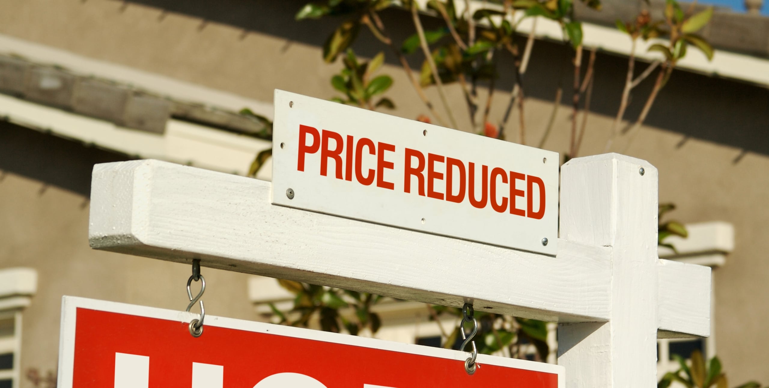 price reduced sign on for sale sign as a seller concession