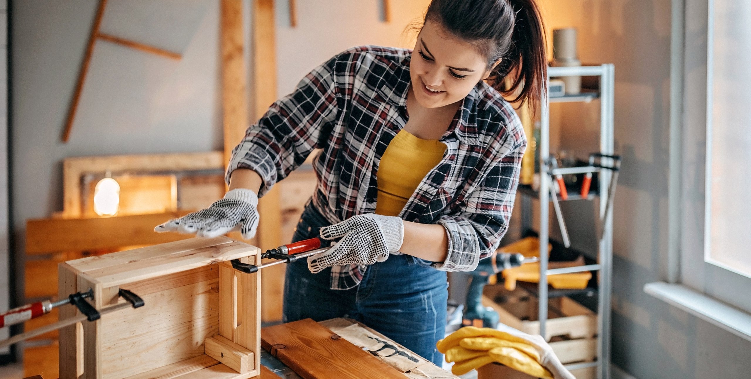 real estate investor building cabinets for her DIY project