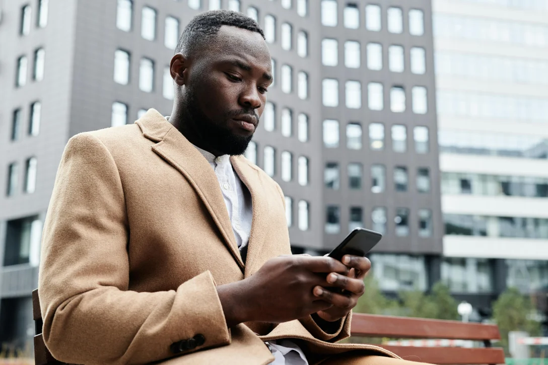 An investor reading a direct message from a business